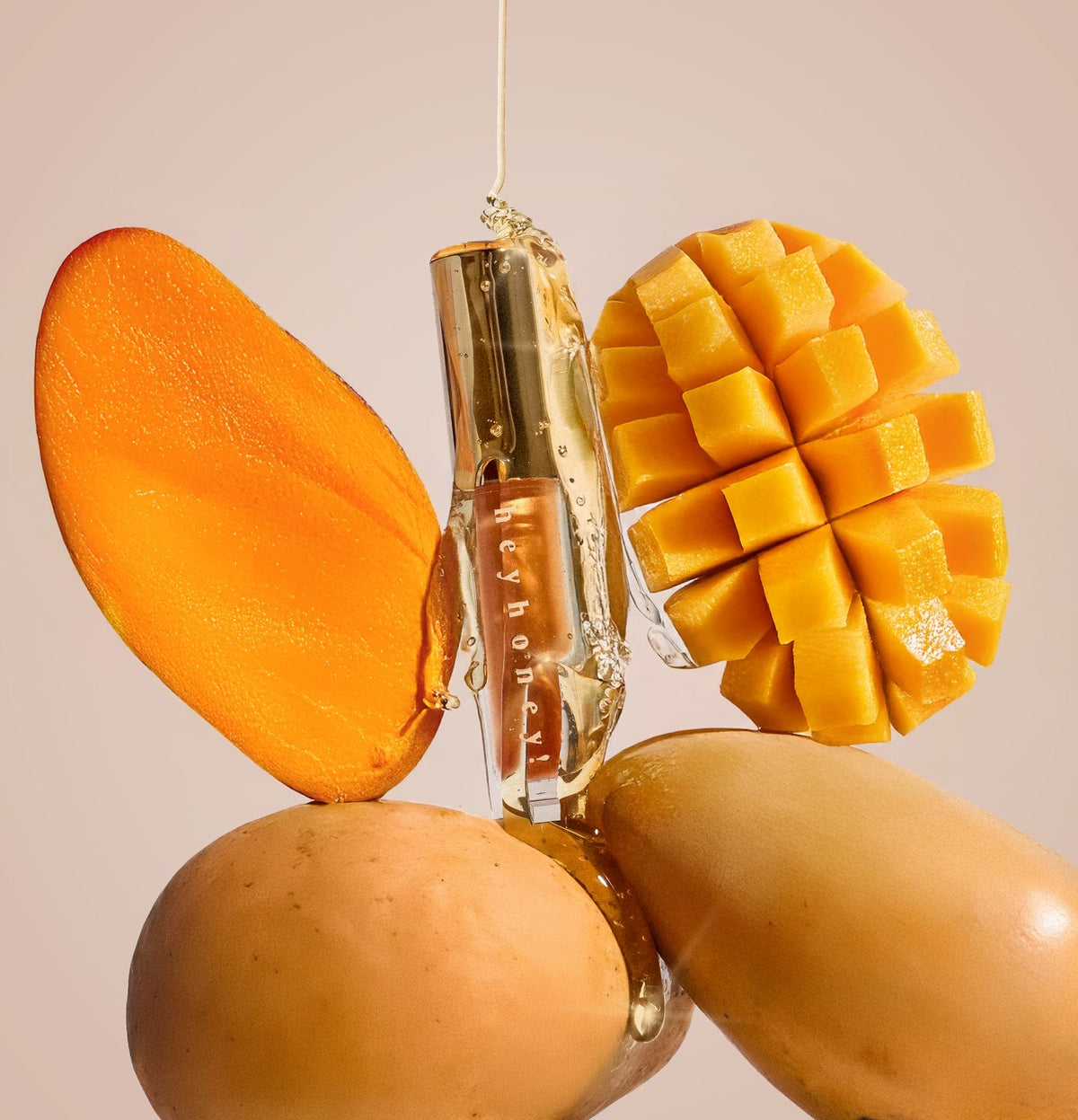 HeyHoney Sparkly Mango Tinted Lip Oil