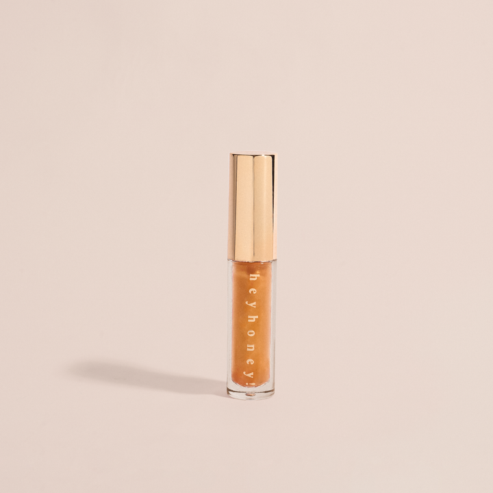 Translation missing: en.HeyHoney Tinted Lip Oil Sparkly Mango with SPF 10 ML for Deep Hydra